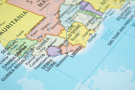 Close up to a monrovia city with a white pin needle into Liberia country political mapの写真素材