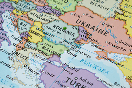 Close up to a Varna city with a green pin needle into Bulgaria country political map