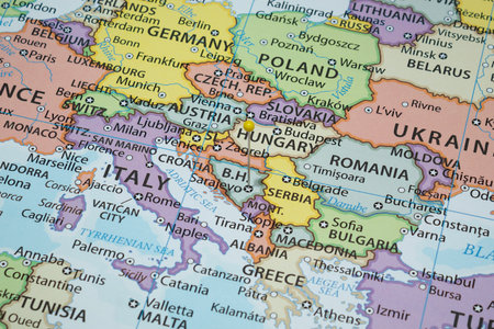 Close up to a Sarajevo city with a yellow pin needle into Bosnia and Herzegovina country political mapの写真素材