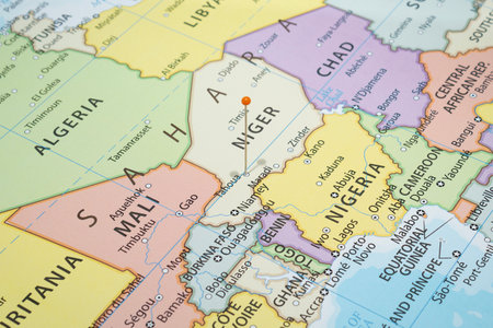 Close up to a Tahoua city with an orange pin needle into Niger country political map