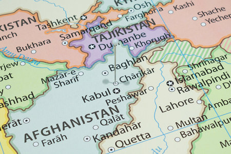 Close up to a Charikar city with a white pin needle into Afghanistan country political map