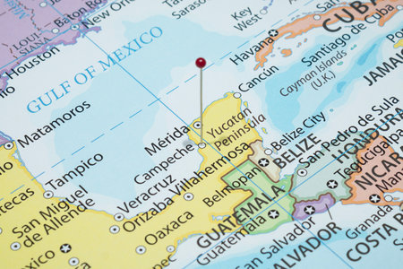 Close up to a Campeche city with a red pin needle into Mexico country political map