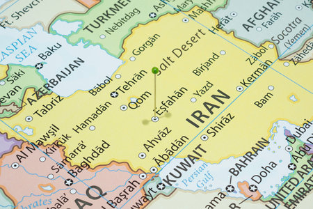 Close up to a Isfahan city with a green pin needle into Iran country political map