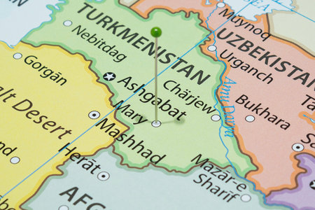 Close up to a Mary city with a green pin needle into Turkmenistan country political map