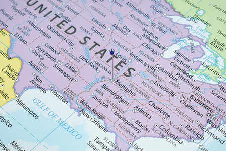 Close up to a Memphis city with a blue pin needle into United States of America country political mapの写真素材