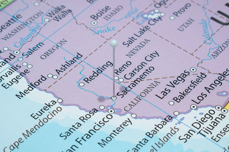 Close up to a Sacramento city with a white pin needle into United States of America country...