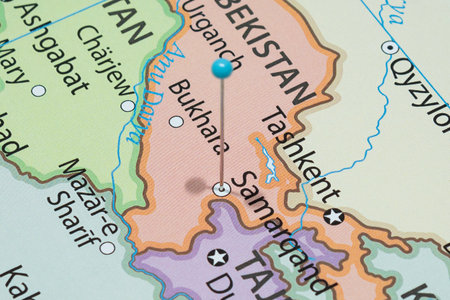 Close up to a Samarkand city with a light blue pin needle into Uzbekistan country political map