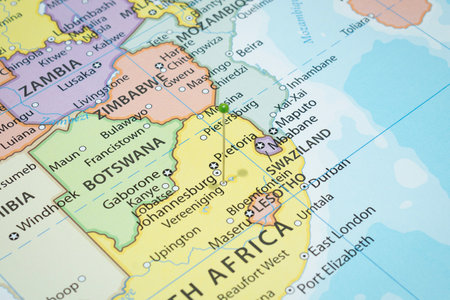 Close up to a Vereeniging city with a green pin needle into South Africa country political map