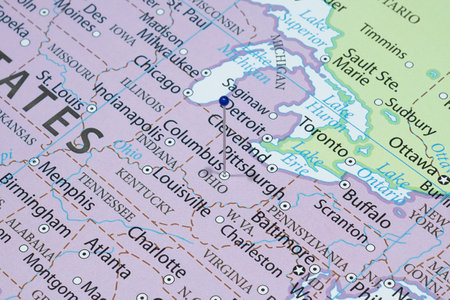Close up to a Columbus city with a blue pin needle into United States of America country political mapの写真素材