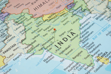 Close up to a Burhanpur city with an orange pin needle into India country political mapの写真素材