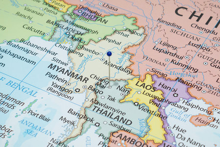 Close up to Chiang Mai city with a blue pin needle into Thailand country political mapの写真素材