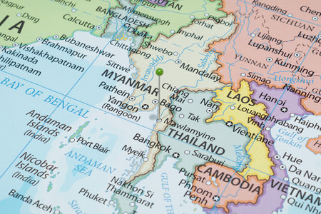 Close up to a Mawlamyine city with a green pin needle into Myanmar country political mapの写真素材