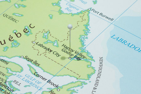 Close up to a Happy Valley city with a white pin needle into Canada country political map