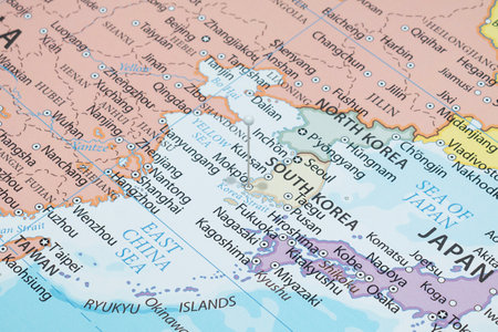 Close up to a Mokpo city with a white pin needle into South Korea country political mapの写真素材