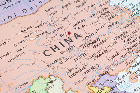 Close up to a Chengdu city with a red pin needle into China country political mapの写真素材