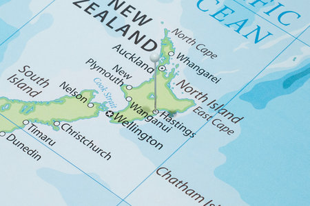 Close up to a Hastings city with a white pin needle into New Zealand country political mapの写真素材