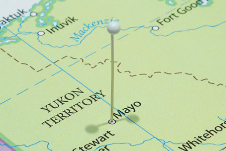 Close up to a Mayo city with a white pin needle into a Canada country political mapの写真素材
