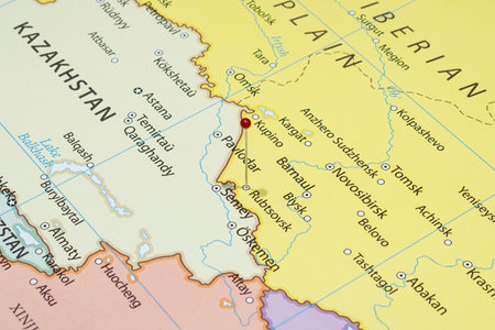 Close up to a Rubtsovsk city with a white pin needle into Russia country political mapの写真素材