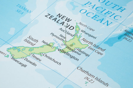 Close up to a Whanganui city with a white pin needle into New Zealand country political mapの写真素材