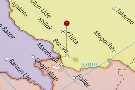 Close up to a Borzya city with a red pin needle into Russia country political mapの写真素材