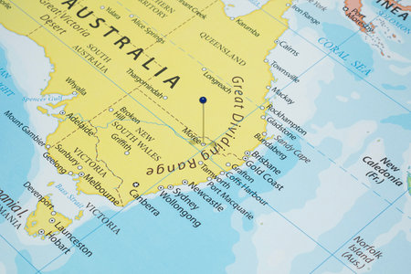 Close up to a Moree city with a blue pin needle into Australia country mapの写真素材