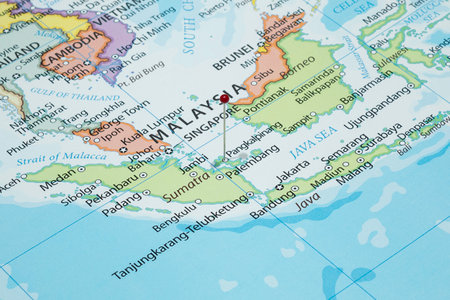 Close up to a Pangkalpinang city with a red pin needle into Indonesia country political mapの写真素材