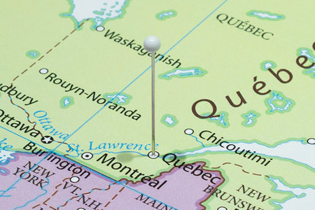 Close up to a Quebec city with a white pin needle into Canada country political mapの写真素材