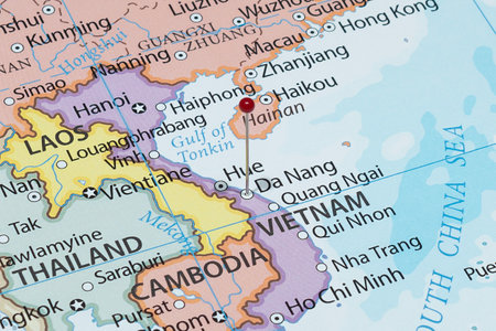 Close up to a Da Nang city with a red pin needle into Vietnam country political mapの写真素材