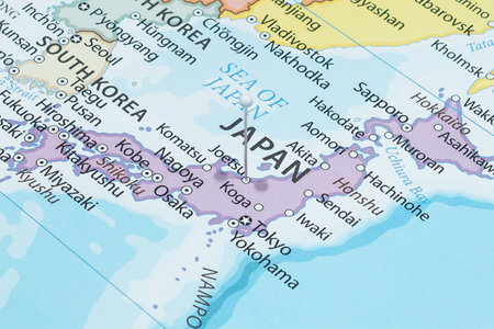 Close up to a Joetsu city with a white pin needle into Japan country political mapの写真素材