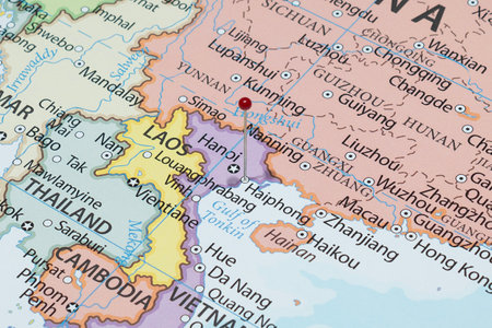 Close up to a Haiphong city with a red pin needle into Vietnam country political mapの写真素材