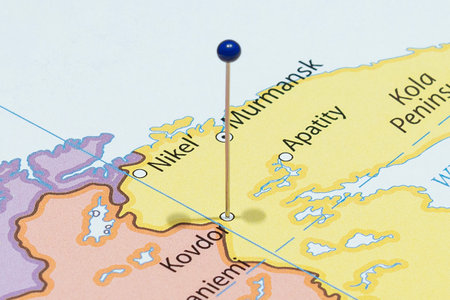 Close up to a Kovdor city with a blue pin needle into Russia country political mapの写真素材