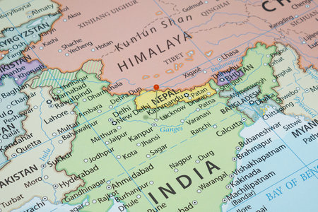 Close up to a Lucknow city with an orange pin needle into India country political mapの写真素材