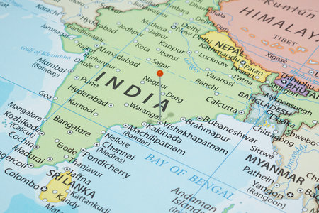 Close up to a Vishakhapatnam city with an orange pin needle into India country political mapの写真素材