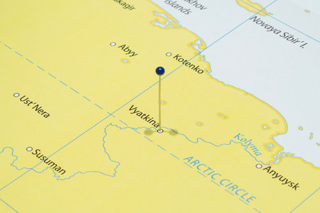 Close up to a Vyatkina city with a blue pin needle into Russia country political mapの写真素材