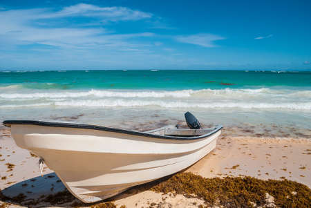 Motorboat on the beach of the Atlantic coastの写真素材