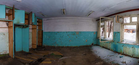 The office in a workshop of the abandoned factoryの写真素材