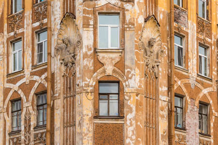 St. Petersburg, Russia - March 10, 2016: Several windows in row on corner of facade of urban apartment building front viewのeditorial素材