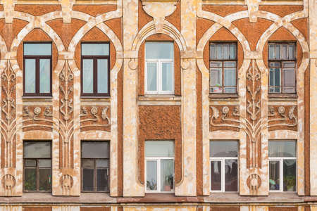 St. Petersburg, Russia - March 10, 2016: Several windows in row on facade of urban apartment building front viewのeditorial素材