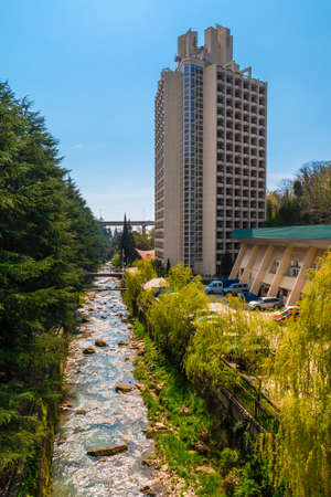 Sochi, Russia - March 30, 2016: High-rise hotel on the shore of a mountain riverのeditorial素材