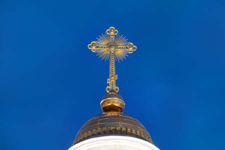 Night view of the golden cross on the dome of the Trinity Cathedral, St. Petersburg, Russiaの写真素材