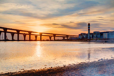 Construction of the Western High-Speed ??Diameter on the background of beautiful sky at sunsetの写真素材