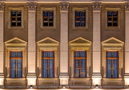 St. Petersburg, Russia - June 07, 2016: Several windows in a row on night illuminated facade of...