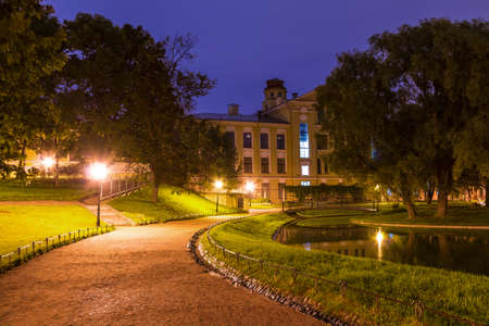 Night view of alley, park and pond in Yusupov Garden, Saint Petersburg, Russiaのeditorial素材