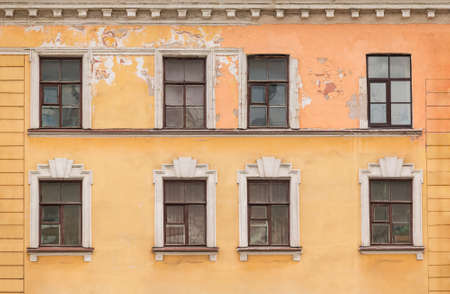 Several windows in a row on facade of the urban office building front view, St. Petersburg, Russiaの写真素材