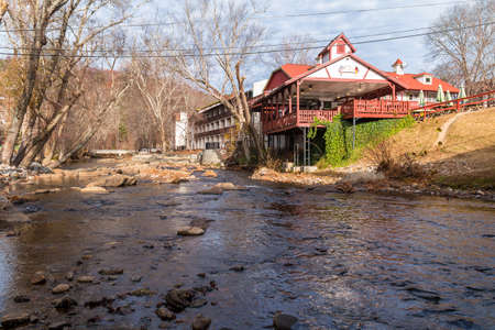 Helen, Georgia, USA - December 14, 2016: View of the Chattahoochee river and the buildings on its shoreのeditorial素材