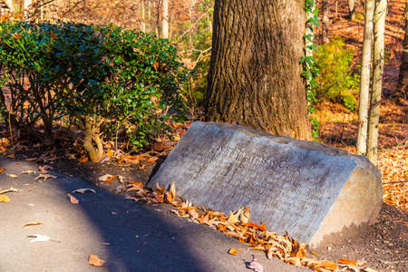The memorial stone of Ernest Richardson in the Lullwater Park in sunny autumn day, Atlanta, USAの写真素材