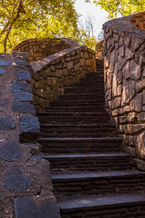 Stone stairs leading upward in the Stone Mountain Park in sunny autumn day, Georgia, USA