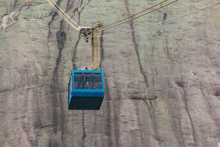 Cabin of the cableway in the Stone Mountain Park on the background of mountainside, Georgia, USAのeditorial素材