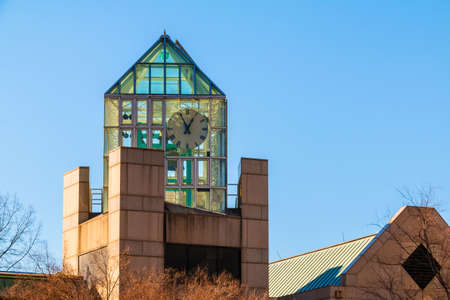 The clock tower of Fulton County Emergency Communications in sunny autumn day, Atlanta, USA