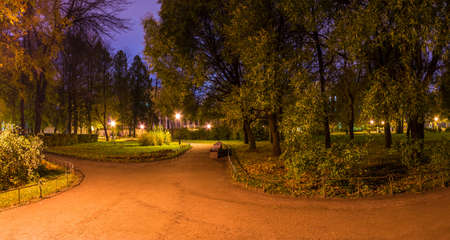 Panoramic night view of park and footpath in Yusupov Garden, Saint Petersburg, Russiaの写真素材